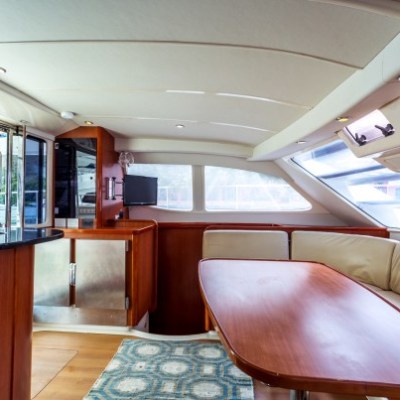 a room filled with furniture and a large window